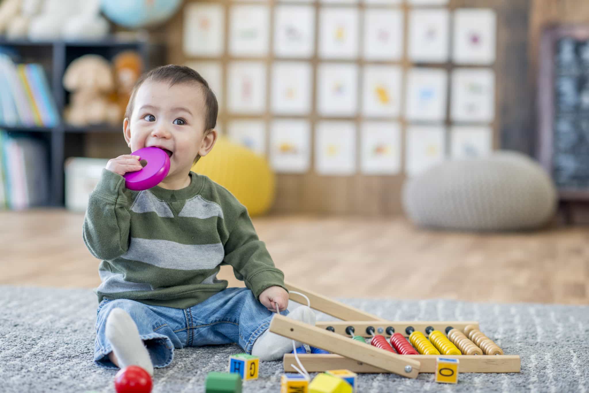 Child playing with toys, risk of lead poisening