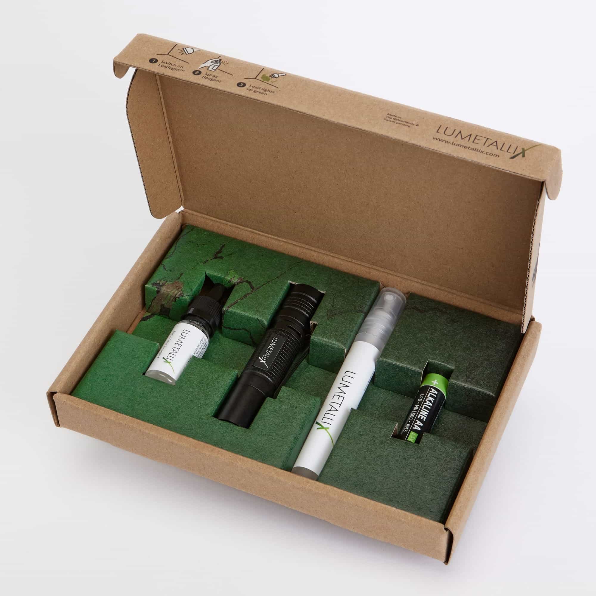 Open Lumetallix box with products: Lumetallix™ Reagent, Lumetallix™ LeadLight™ + Battery